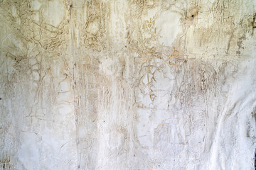 Abstract view of cracked, peeling, destroyed paint on walls, useful for backgrounds