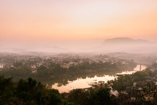 Sunrise and mist over Luang Prabang, Laos from Mount Phousi