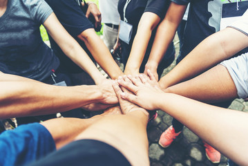 Solidarity unite people hands together community teamwork. Hands of spirit team working together...