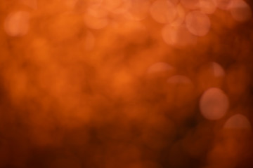 Orange bokeh and yellow blur abstract