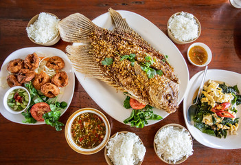 Fried Rhino Fish, Fried Fish Cake, Fried Liang Vegetables with Egg for lunch. Asian food, Thai cuisine concept.