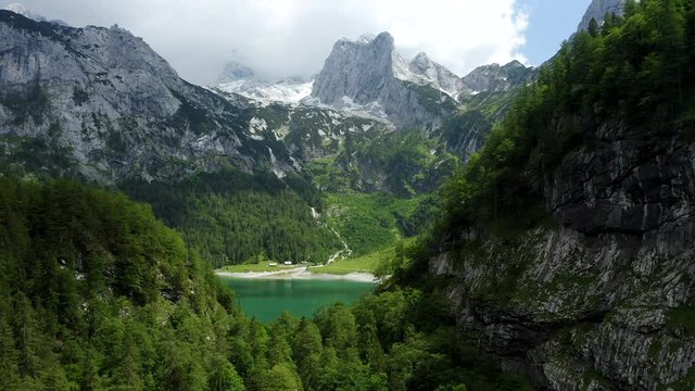 Aerial view of Dachstein mountain top and Hinterer Gosausee lake Upper Austria