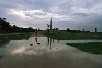 A beautiful scenery of the greenery and reflection in coronation park  delhi