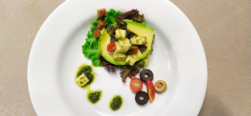 Avocado salad ready to serve on the table