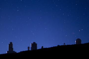 Beautiful view of an observatory under a starry sky