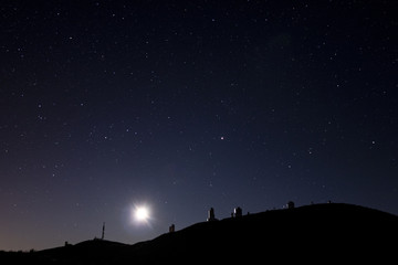 Beautiful view of an observatory under a starry sky