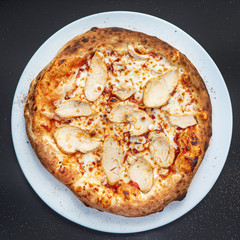 pizza on the black background, top view
