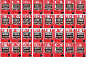 Red switch fire alarm presented as background Ideal for design, image and text insertion.