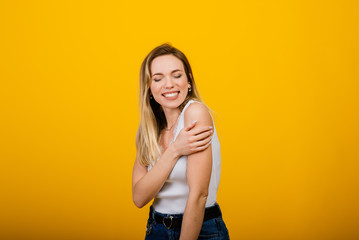 Positive human emotions. Headshot of happy emotional woman laughing from the bottom of her heart, showing perfect white teeth while having fun