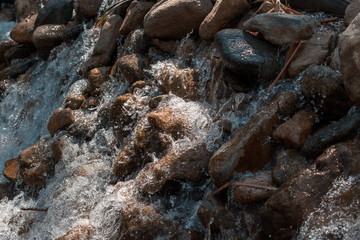 water flowing through rocks