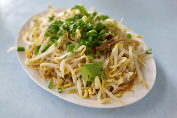 Stir-fried bean sprout with soy sauce, Chinese food.