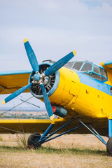 CLOSE UP photo of airplane details sitting in airport, preparing for flight.