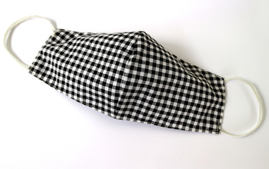 Checkered mask on white background