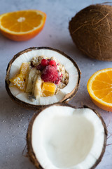 Smoothie bowl with colorful tropical fruits. Summer healthy diet, vegan breakfast.