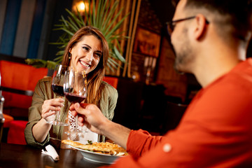 Young couple enjoying lunch in the restaurant