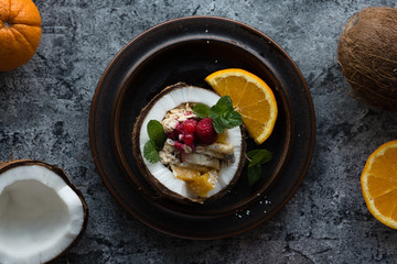 Smoothie bowl with colorful tropical fruits. Summer healthy diet, vegan breakfast.