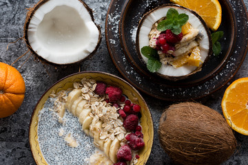 Smoothie bowl with colorful tropical fruits. Summer healthy diet, vegan breakfast.
