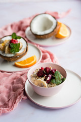 Smoothie bowl with colorful tropical fruits. Summer healthy diet, vegan breakfast.