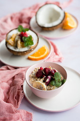Smoothie bowl with colorful tropical fruits. Summer healthy diet, vegan breakfast.