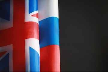 The concept of diplomatic relations. Flag of the United States of America and the Russian...