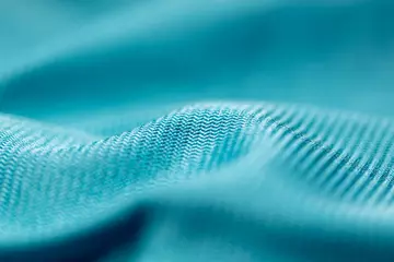Foto op Plexiglas Blue fabric as an abstract background. © schankz