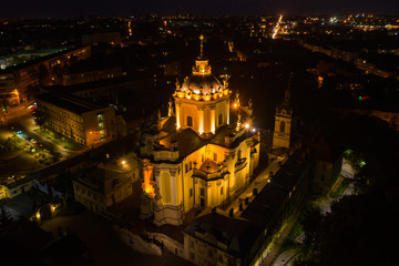 Fototapeta na wymiar Aerial view on St. George's Cathedral in Lviv, Ukraine from drone at night