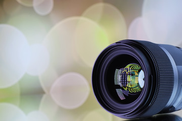 Equipment videographer and photographer. Lenses on the table against the background of bright...