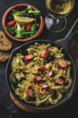 Pasta with slices of octopus