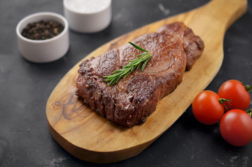 Grilled steak on cutting board