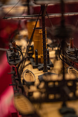 Macro photo of miniature steamer model in brown tones