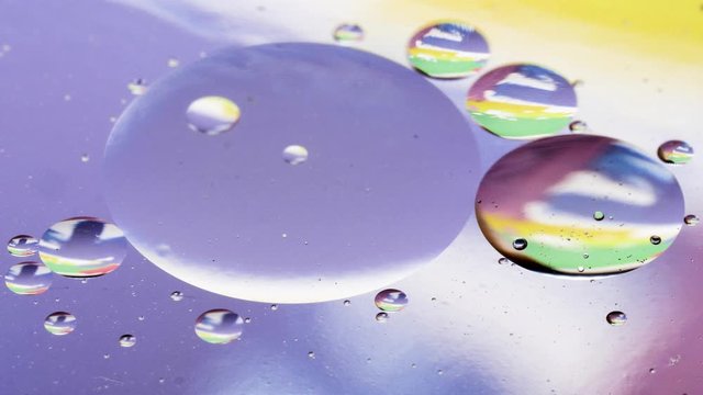 Macro shot of colorful shiny bubbles and rainbow colors