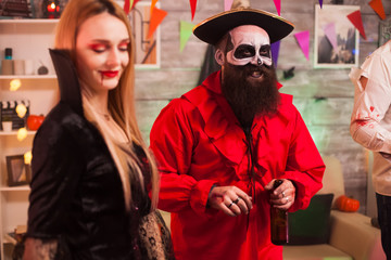 Man dressed up like an evil medieval pirate at halloween party.