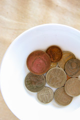 A pile of kopeks on a white background.