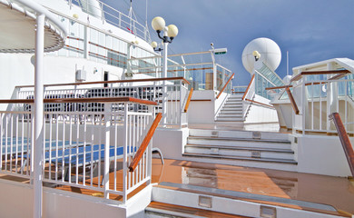 Outdoor Sun deck with deck chairs, sun loungers on modern Norwegian cruiseship or cruise ship liner...
