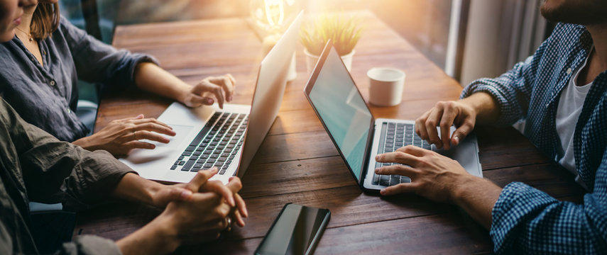 Group of young people working together. Creative business people in modern office