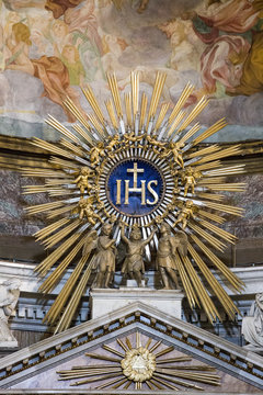 Shot of a golden star with the insignia "IHS"