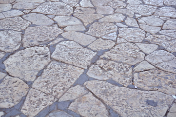 Old pavement. Roadway pattern for background.