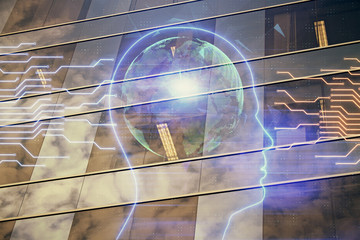 Brain hologram drawing on city scape background Double exposure. Brainstorming concept.