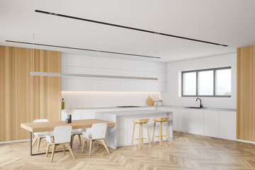 White and wooden kitchen corner with bar