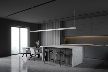 Grey and wood kitchen corner with bar and window