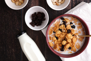 Cereal dessert with corn oat and dry fruits isolated in wood background
