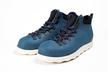 Pair of cool urban boots. Urban style male footwear isolated