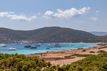 Seascape with yachts on the sea off the coast of Ses Salines (Las Salinas) on Ibiza island