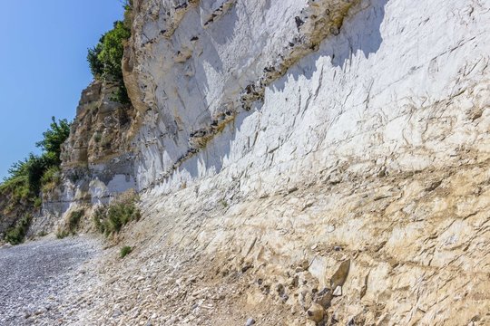 Layers of chalk and flint in the unique  limestone cliff created by the Ice Age at UNESCO site Stevns Klint, Denmark