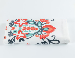 Top view of a colorful decorative towel on a white background