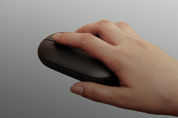  Technology Concept.. Woman hand on computer keyboard wireless mouse.İsolated gray background.