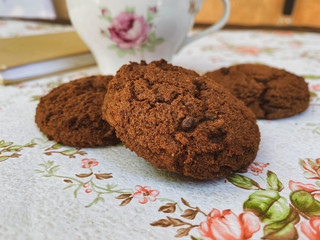 Chocolate cookie and cup of tea 