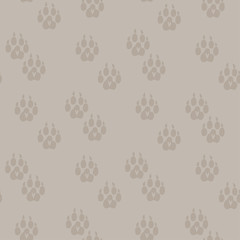 Abstract beige seamless pattern with tiger paws print. Vector wild cat trail background.