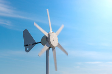 compact wind turbine against the blue sky
