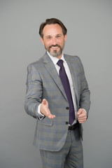 Man handsome mature employee wear formal suit, welcome on board concept